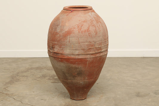 A one-of-a-kind clay brown Turkish vintage vase pot without a handle, crafted from terra cotta clay, this piece showcases timeless quality and antique craftsmanship, adding a unique touch of history to your space