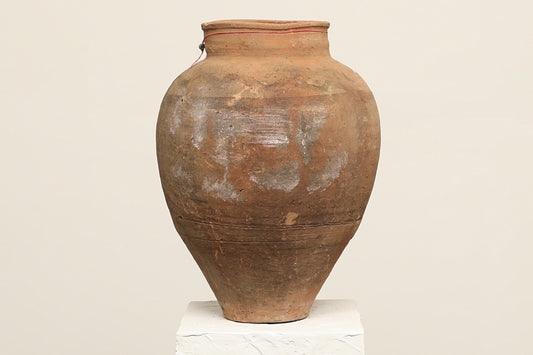 A one-of-a-kind dark brown Turkish vintage vase pot without handle, crafted from terra cotta clay this piece showcases timeless quality and antique craftsmanship, adding a unique touch of history to your space