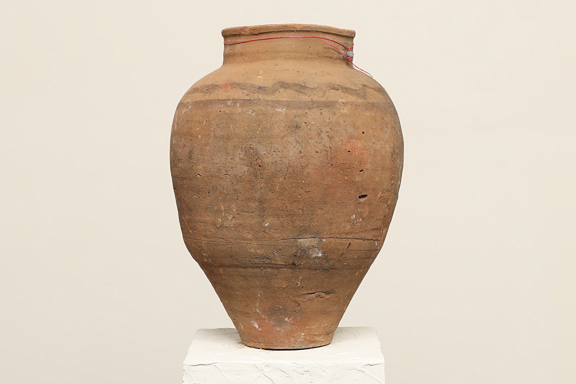 A one-of-a-kind dark brown Turkish vintage vase pot without handle, crafted from terra cotta clay this piece showcases timeless quality and antique craftsmanship, adding a unique touch of history to your space