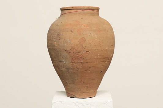 A one-of-a-kind dark brown Turkish vintage vase pot without handle, crafted from terra cotta clay, this piece showcases timeless quality and antique craftsmanship, adding a unique touch of history to your space