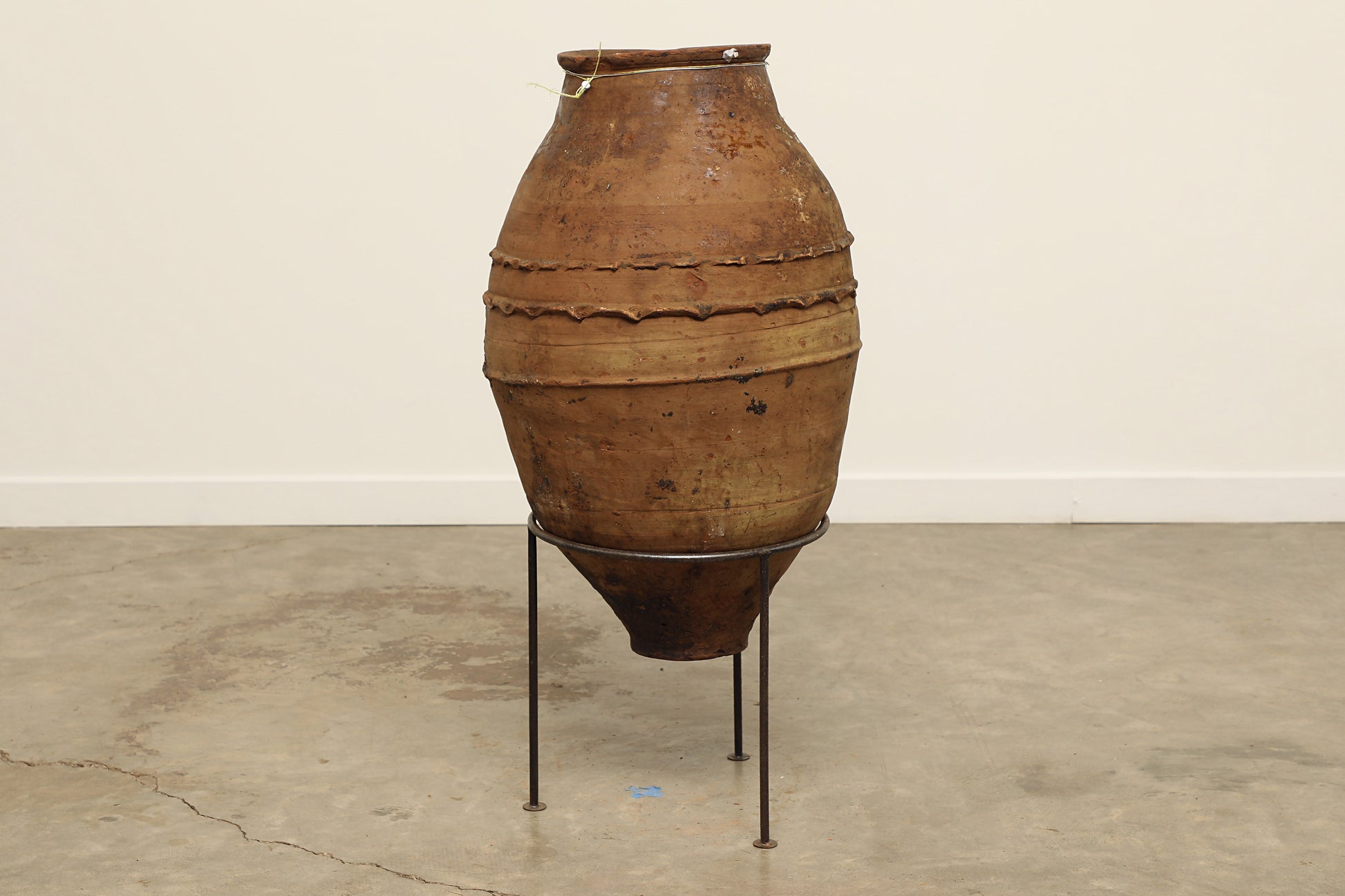A one-of-a-kind dark brown Turkish vintage vase pot without a handle, crafted from terra cotta clay, this piece showcases timeless quality and antique craftsmanship, adding a unique touch of history to your space
