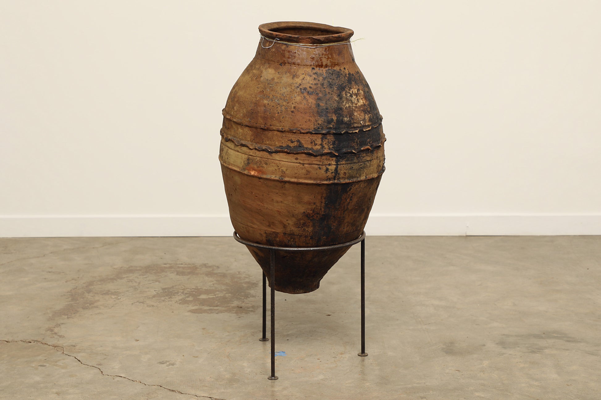 A one-of-a-kind dark brown Turkish vintage vase pot without a handle, crafted from terra cotta clay, this piece showcases timeless quality and antique craftsmanship, adding a unique touch of history to your space
