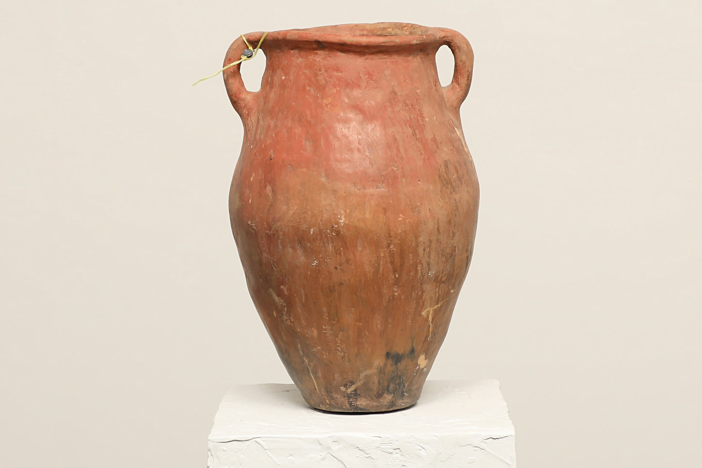 A one-of-a-kind rustic red Turkish vintage vase pot with two handles, crafted from terra cotta clay, crafted from reclaimed solid wood, this piece showcases timeless quality and antique craftsmanship, adding a unique touch of history to your space