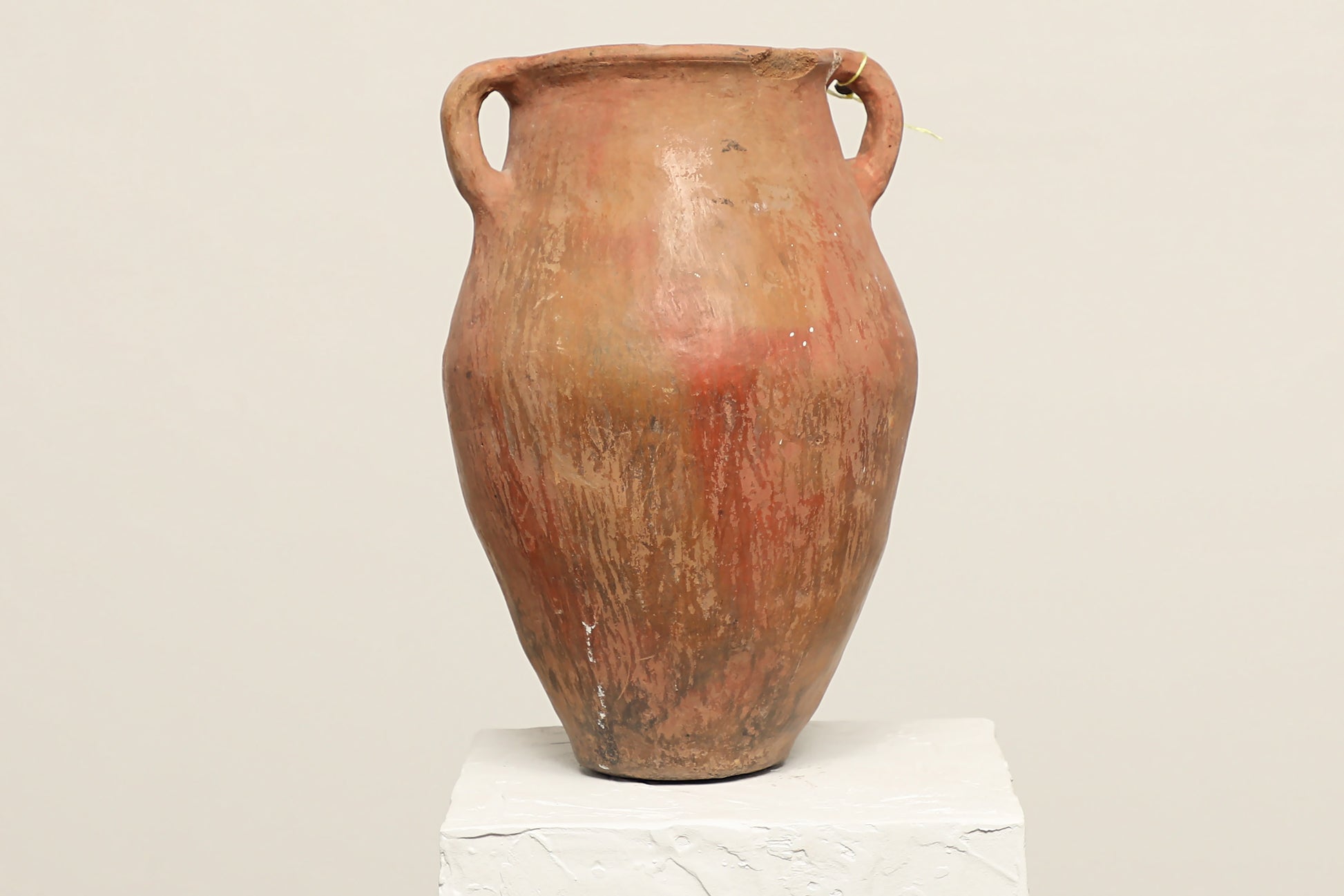 A one-of-a-kind rustic red Turkish vintage vase pot with two handles, crafted from terra cotta clay, crafted from reclaimed solid wood, this piece showcases timeless quality and antique craftsmanship, adding a unique touch of history to your space