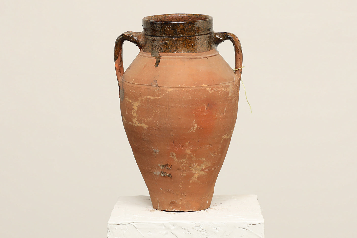 A one-of-a-kind rustic red Turkish vintage vase pot with two handles, crafted from terra cotta clay, this piece showcases timeless quality and antique craftsmanship, adding a unique touch of history to your space