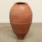 A one-of-a-kind rustic red Turkish vintage vase pot without a handle, crafted from terra cotta clay, this piece showcases timeless quality and antique craftsmanship, adding a unique touch of history to your space