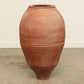 A one-of-a-kind rustic red Turkish vintage vase pot without a handle, crafted from terra cotta clay, this piece showcases timeless quality and antique craftsmanship, adding a unique touch of history to your space