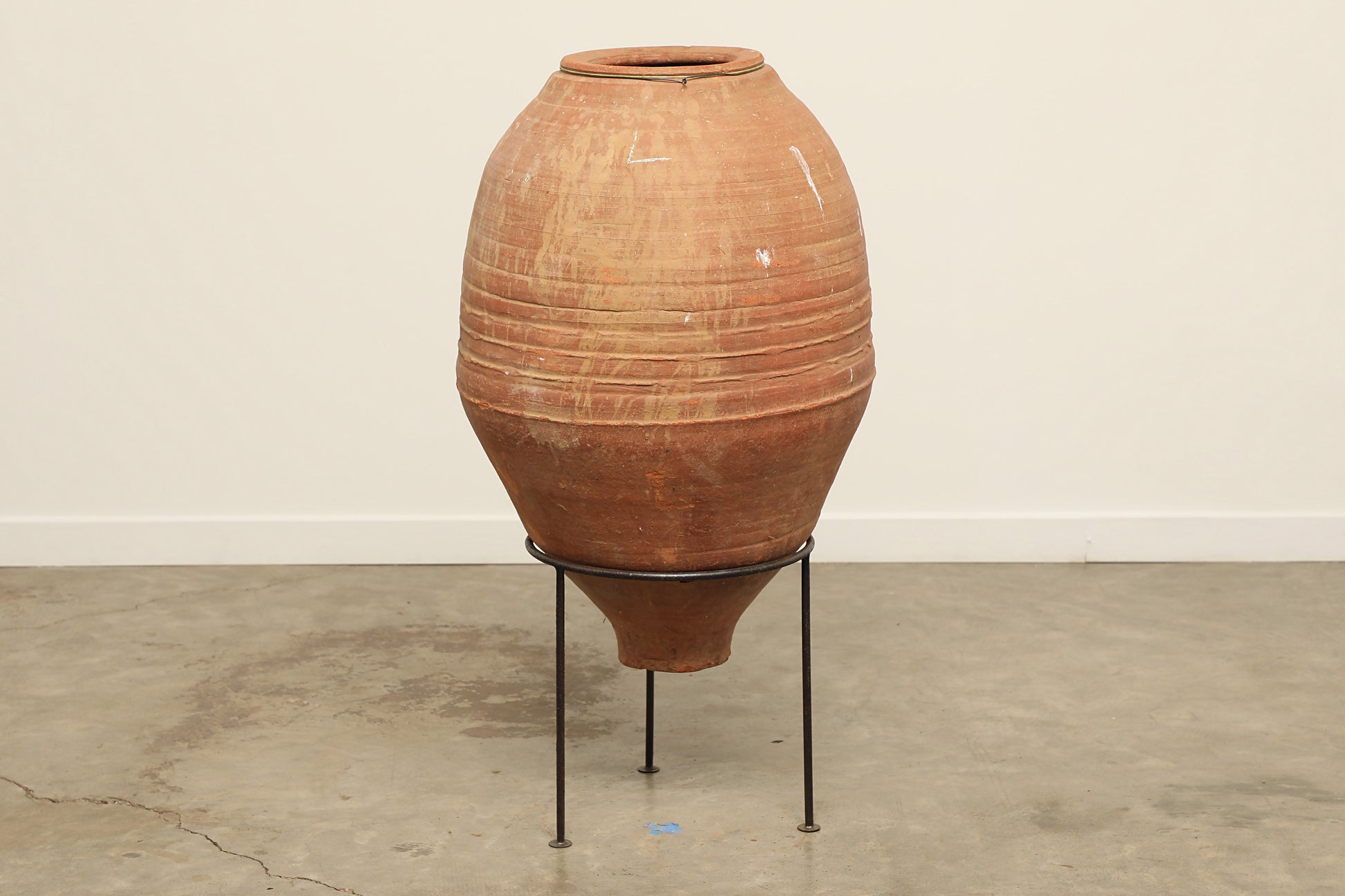 A one-of-a-kind rustic red Turkish vintage vase pot without handle, crafted from terra cotta clay, this piece showcases timeless quality and antique craftsmanship, adding a unique touch of history to your space