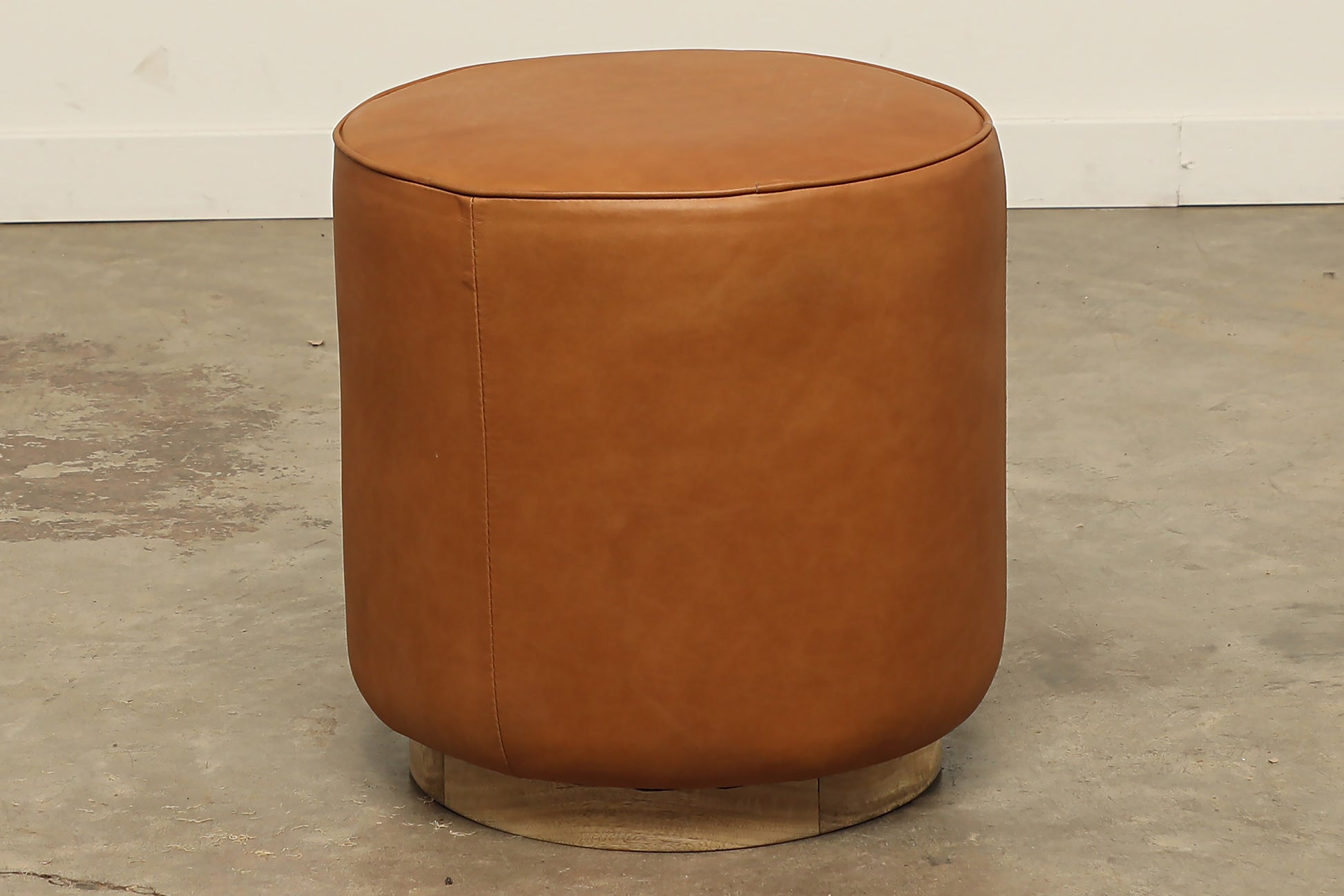 tan leather and mango wood and 18-inch round ottoman