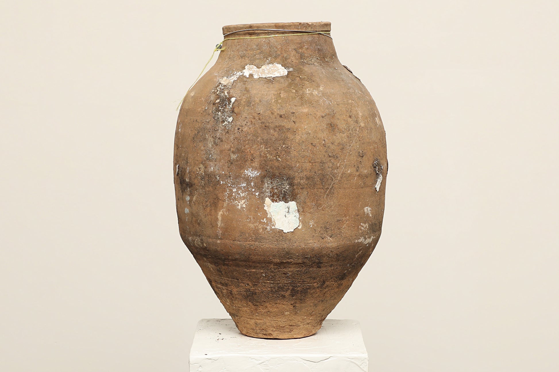 A one-of-a-kind clay brown Turkish vintage vase pot without handle, crafted from terra cotta clay, this piece showcases timeless quality and antique craftsmanship, adding a unique touch of history to your space