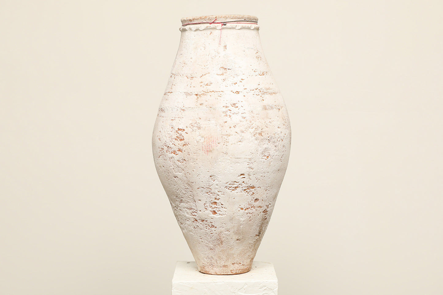A one-of-a-kind white Turkish vintage vase pot without handle, crafted from terra cotta clay, this piece showcases timeless quality and antique craftsmanship, adding a unique touch of history to your space