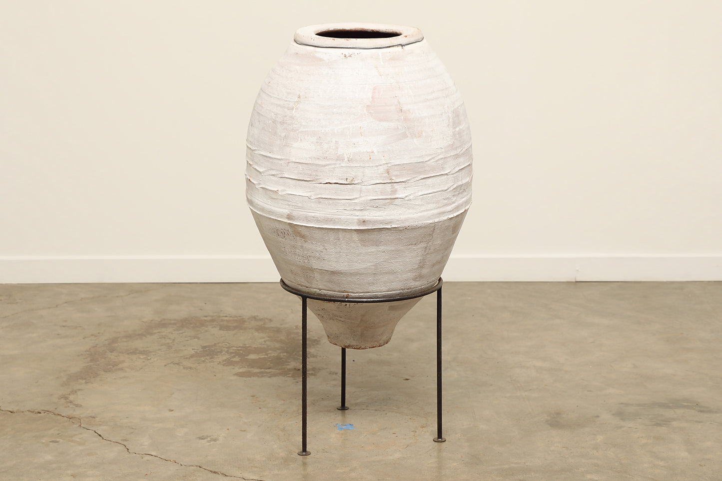 A one-of-a-kind white Turkish vintage vase pot without a handle, crafted from terra cotta clay, this piece showcases timeless quality and antique craftsmanship, adding a unique touch of history to your space