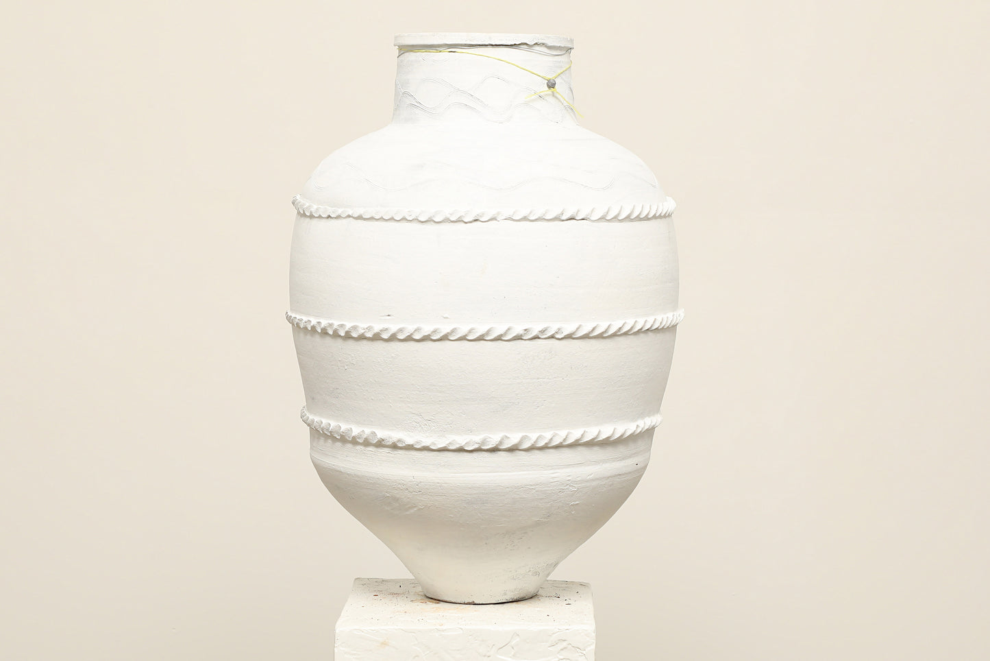 A one-of-a-kind white Turkish vintage vase pot without handle, crafted from terra cotta clay, this piece showcases timeless quality and antique craftsmanship, adding a unique touch of history to your space