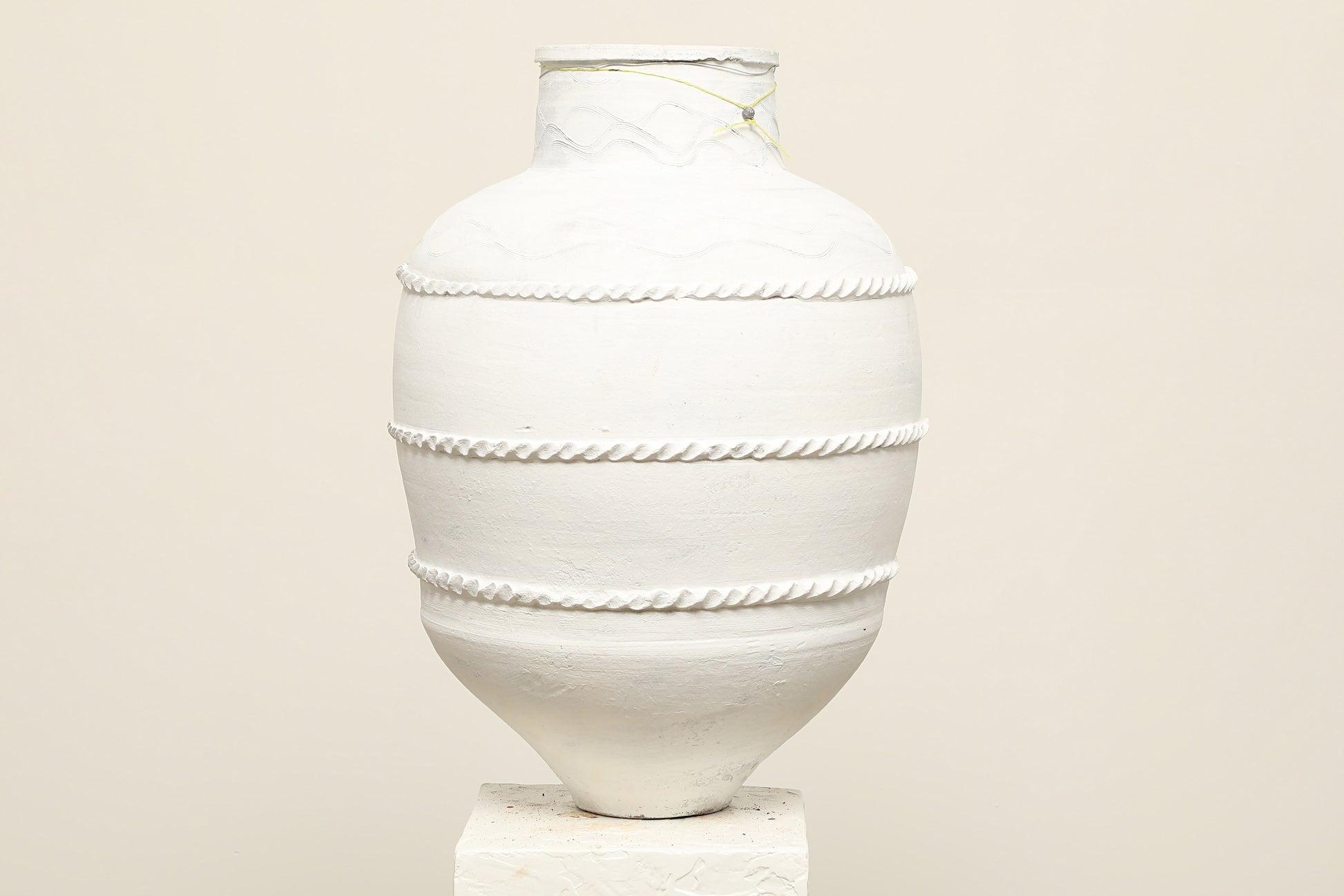 A one-of-a-kind white Turkish vintage vase pot without handle, crafted from terra cotta clay, this piece showcases timeless quality and antique craftsmanship, adding a unique touch of history to your space