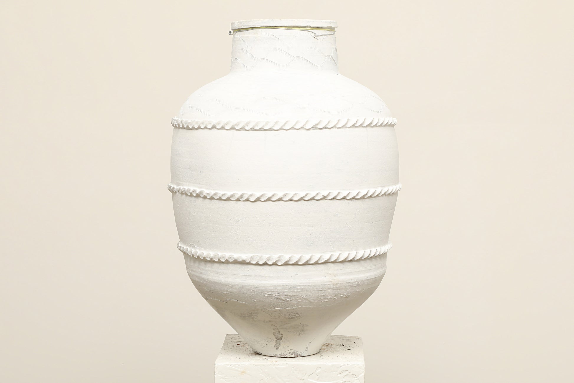 A one-of-a-kind white Turkish vintage vase pot without handle, crafted from terra cotta clay, this piece showcases timeless quality and antique craftsmanship, adding a unique touch of history to your space