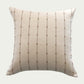 Brown woven stripes on a cream cotton background and a 100% off-white linen back in a 20-inch by 30-inch rectangle.