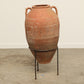 A one-of-a-kind dark brown Turkish vintage vase pot with two handles, crafted from terra cotta clay, this piece showcases timeless quality and antique craftsmanship, adding a unique touch of history to your space