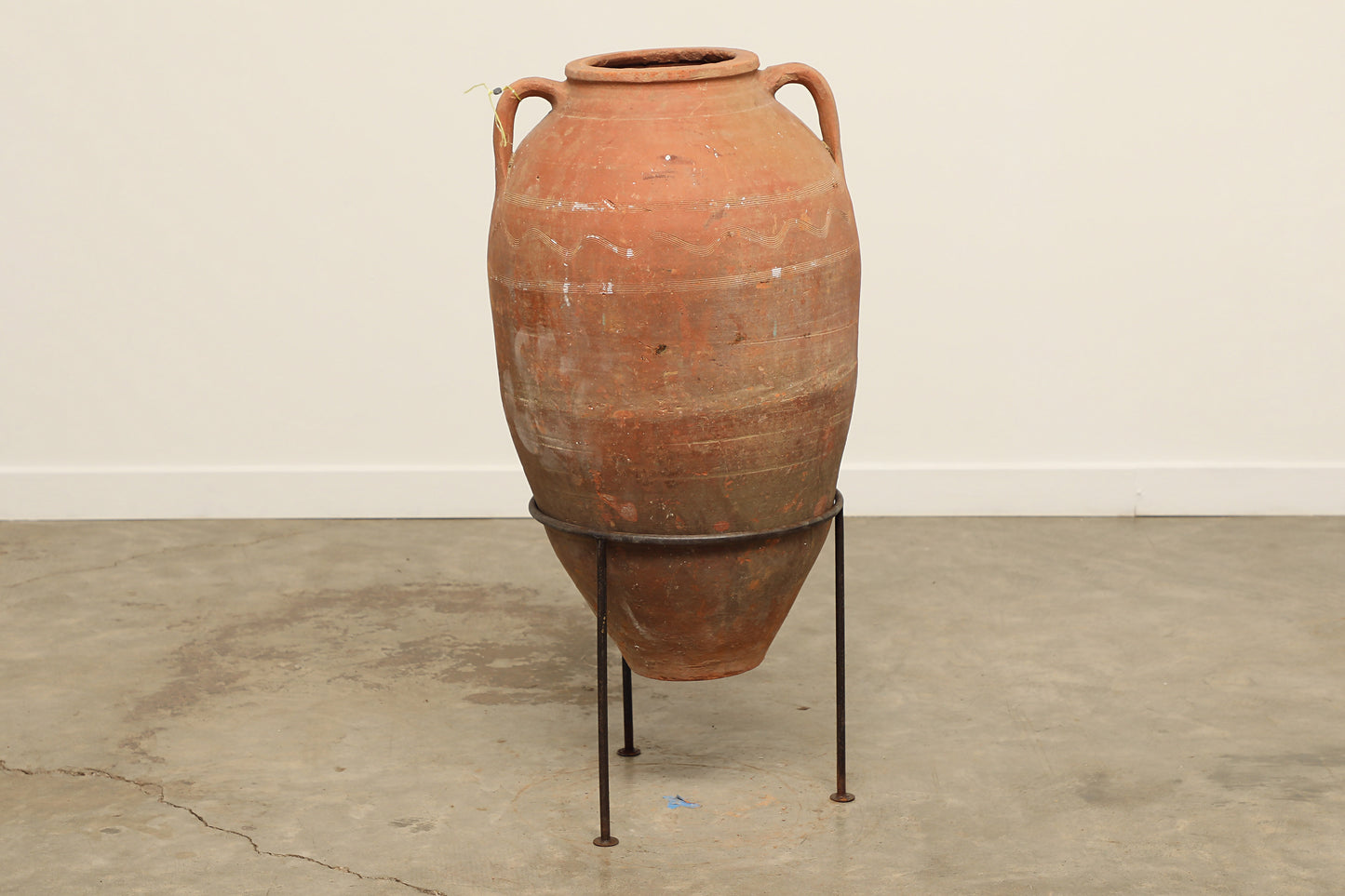 A one-of-a-kind dark brown Turkish vintage vase pot with two handles, crafted from terra cotta clay, this piece showcases timeless quality and antique craftsmanship, adding a unique touch of history to your space