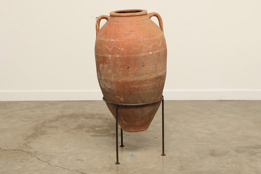 A one-of-a-kind dark brown Turkish vintage vase pot with two handles, crafted from terra cotta clay, this piece showcases timeless quality and antique craftsmanship, adding a unique touch of history to your space