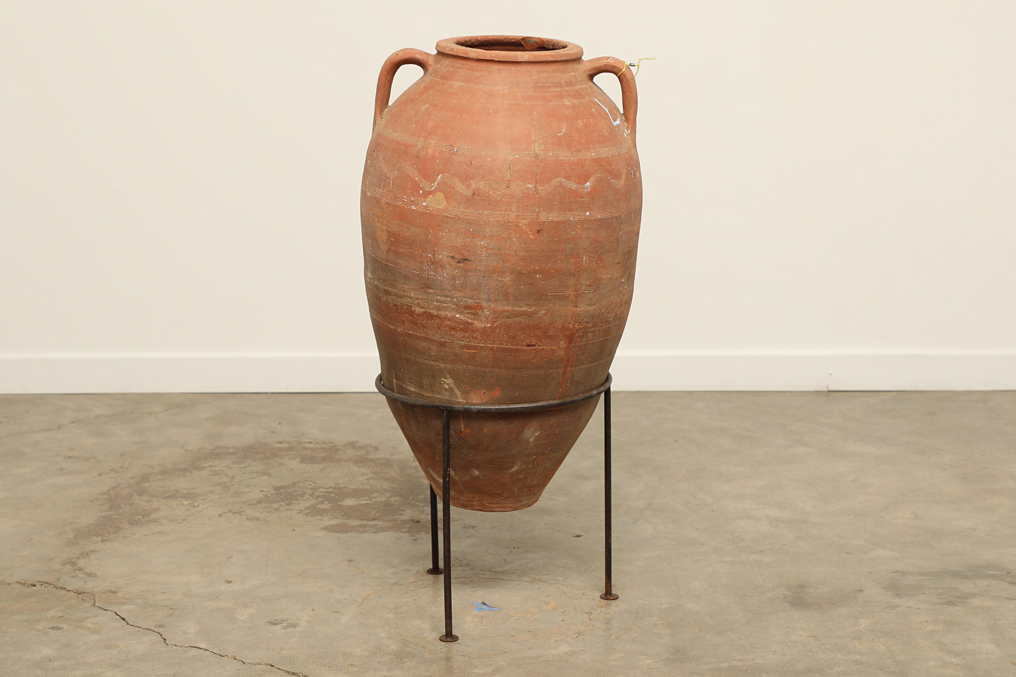 A one-of-a-kind dark brown Turkish vintage vase pot with two handles, crafted from terra cotta clay, this piece showcases timeless quality and antique craftsmanship, adding a unique touch of history to your space