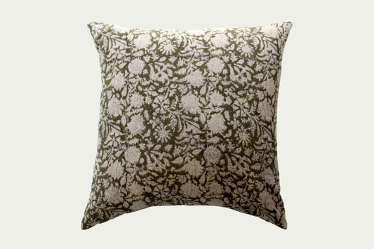 Add dimension and uniqueness to your space with the Perry Floral Throw Pillow. This accent pillow features a dark green hand-blocked print, from India, on a natural linen fabric. Pattern is printed on both sides of pillow.