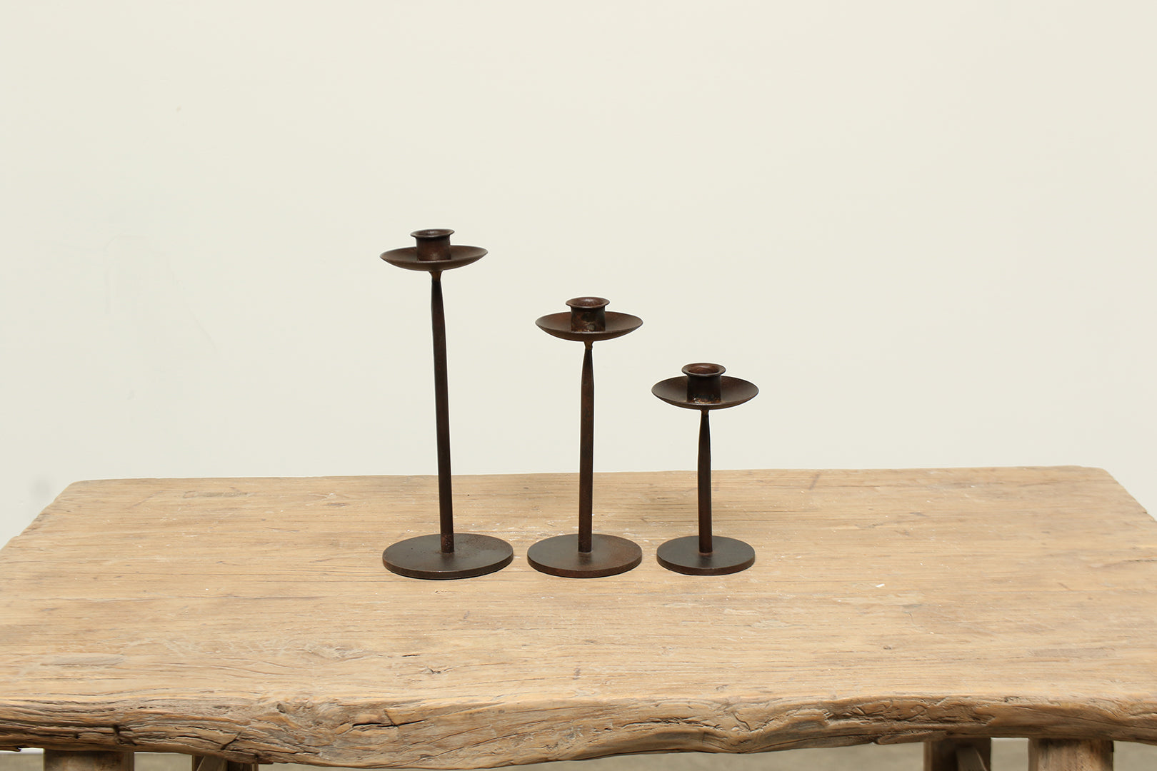 Iron candle holder set of three is simple and timeless

Our Iron candle holder set of three is simple and timeless. Place them in the center of a table, or buy multiple sets and place them together for a dramatic old-world look.