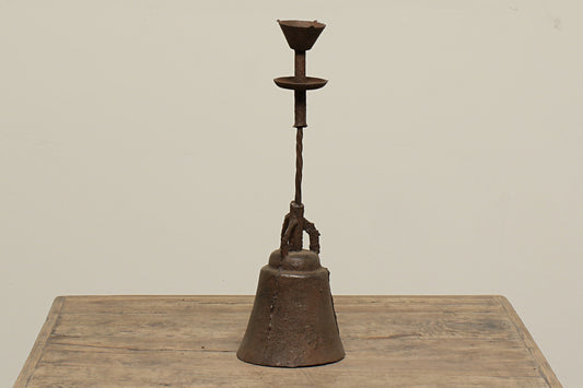 Unique Iron Candlestick twisted eye-catching functional piece.