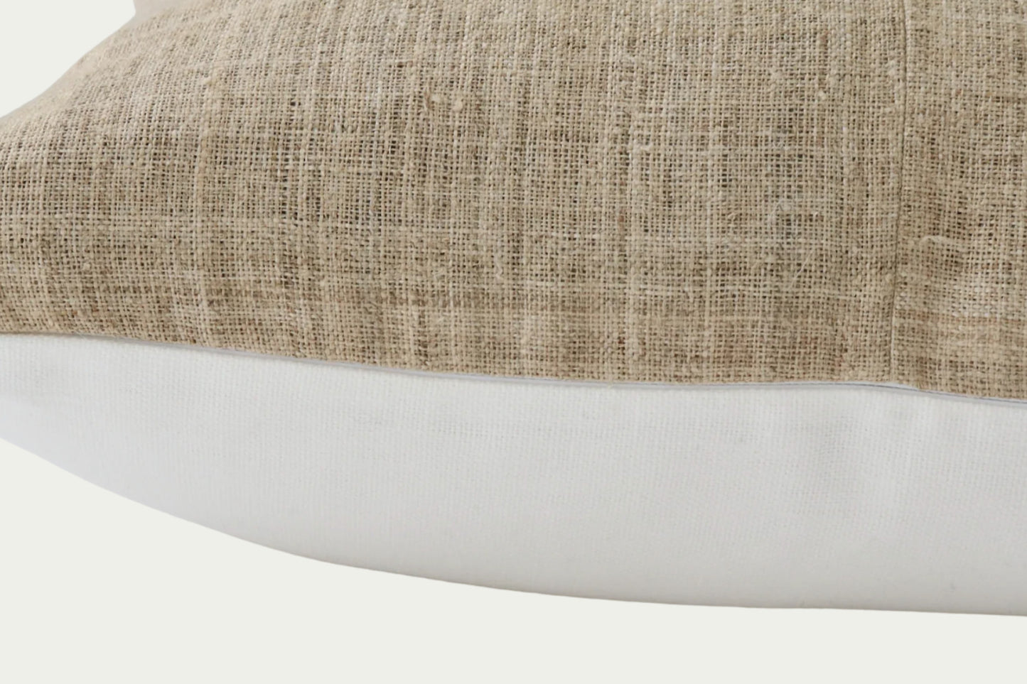 The Jasper Tan Pillow is laid-back and versatile, ready to be styled in any interior space. This modern throw pillow is handwoven from 100% hemp and features a heavy-weight linen back.