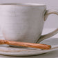 Minimalist oval shape white ceramic tea cup and saucer set for tea or coffee cup