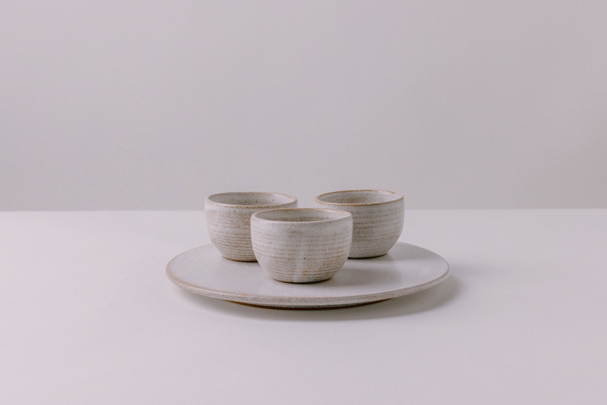 rustic white glaze three bowls and serving platter