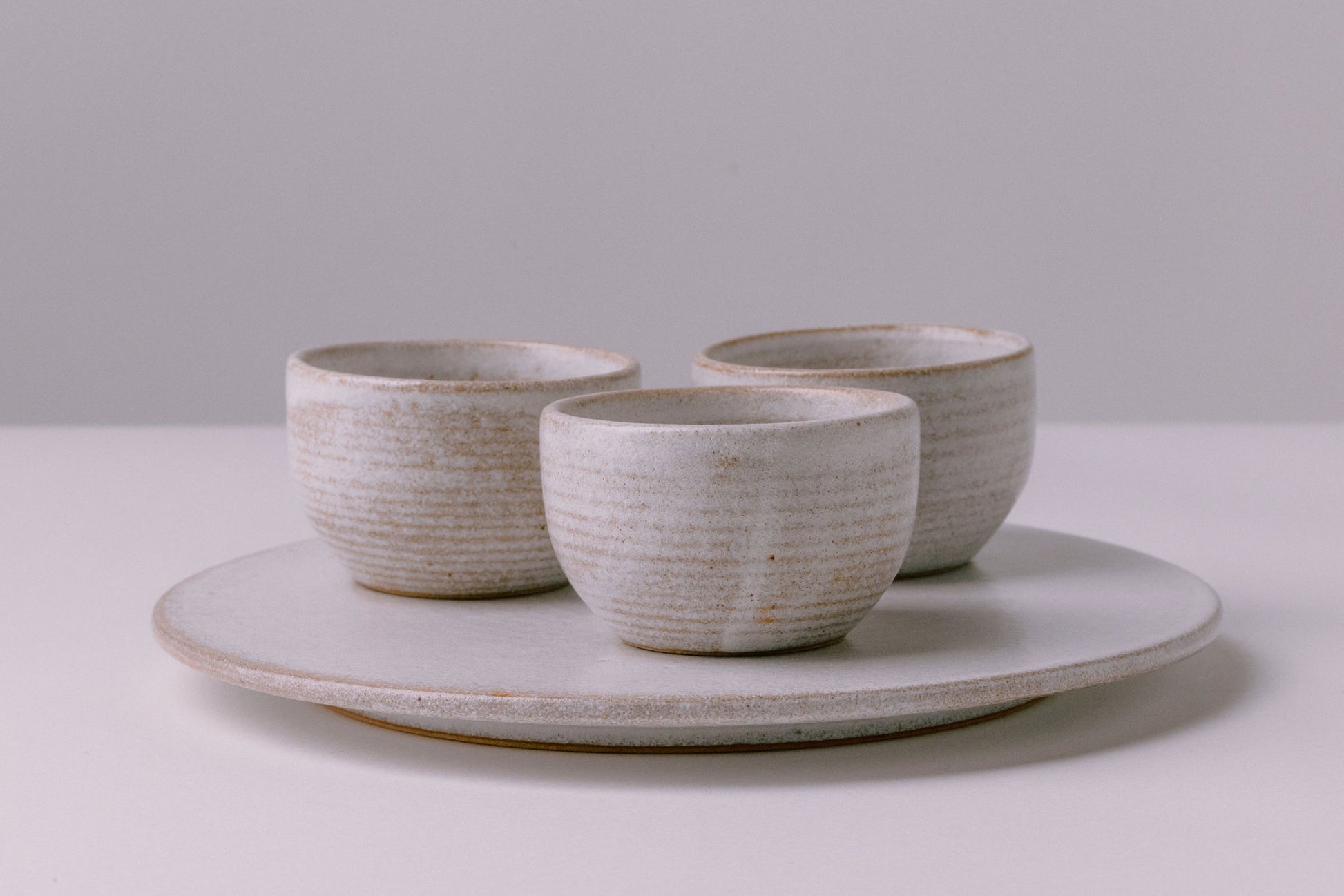rustic white glaze three bowls and serving platter
