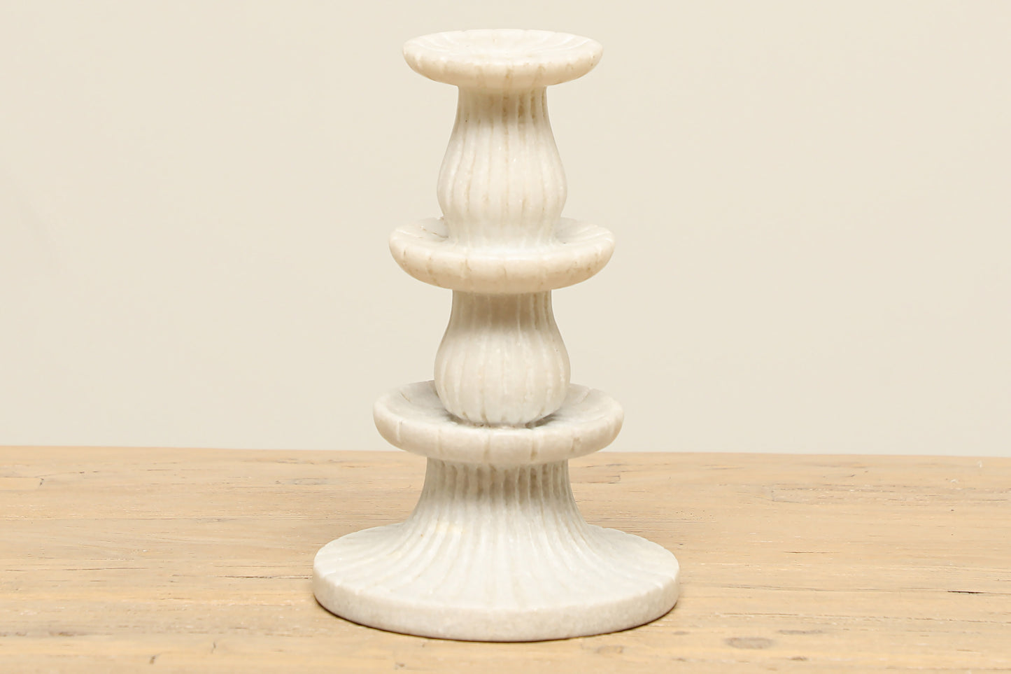 subtle carved three tier white marble candle stand holders