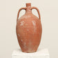 A one-of-a-kind  rustic red Turkish vintage vase pot with two handles, crafted from terry cotta clay, this piece showcases timeless quality and antique craftsmanship, adding a unique touch of history to your space