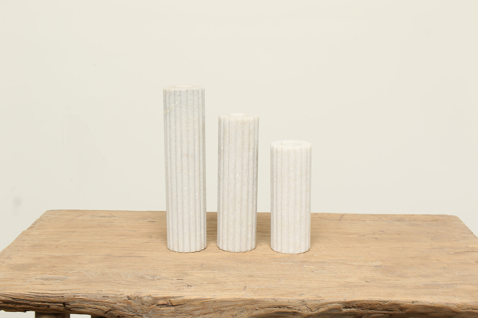 White marble candle holder stand set of three is simple and timeless