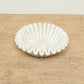 Natural white fluted marble bowl with a ruffle edge - timeless modern home decor.